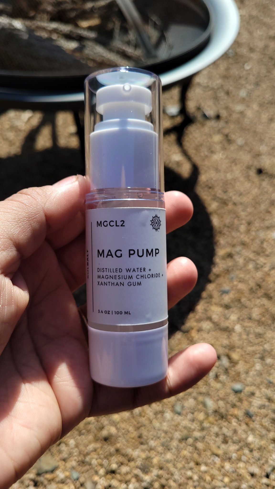 30 mL pump bottle labeled "SOL SALT" video clip of applying and massaging magnesium gel onto the forearm. Easy-pump magnesium gel for targeted relief. Non-greasy, fast-acting.