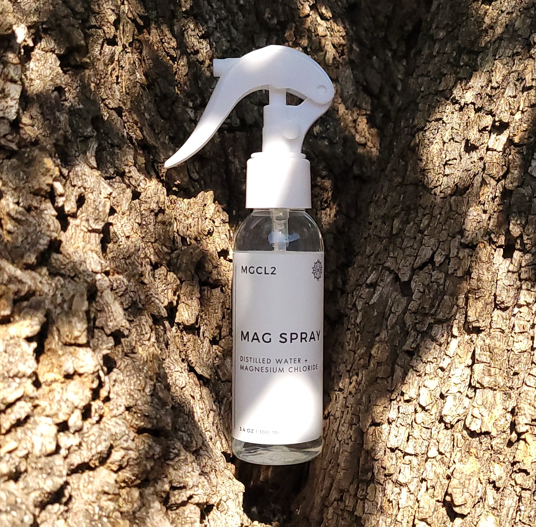 100 mL spray bottle labeled "SOL SALT" nestled within a tree nook.
Rapid Absorption. Relaxes and Restores the body.