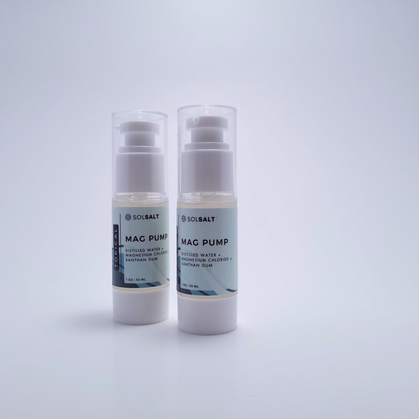 Two 30 mL pump bottles labeled "SOL SALT" in front of a light gray background. Easy-pump magnesium gel for targeted relief. Non-greasy, fast-acting.
