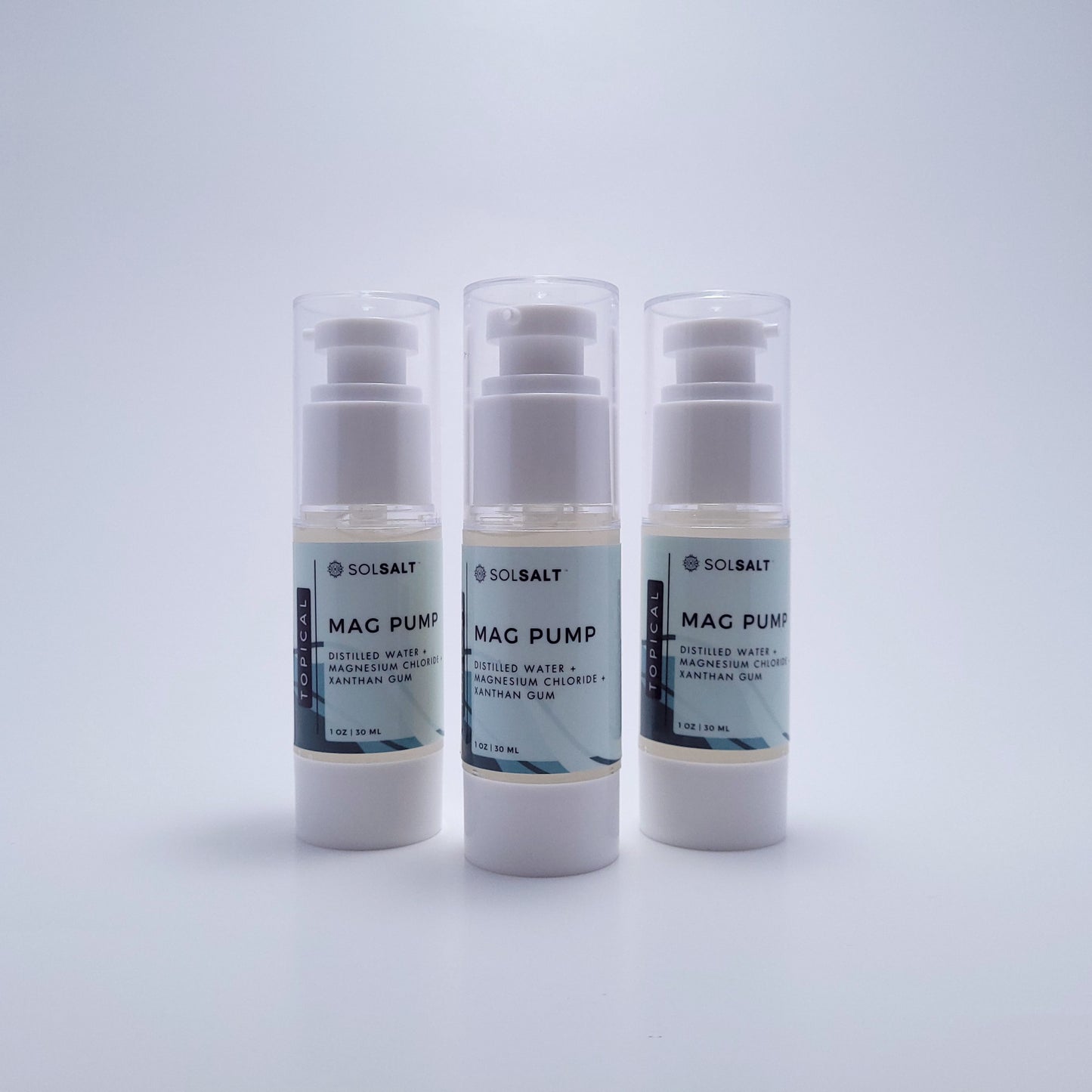 Three 30 mL pump bottles labeled "SOL SALT" in front of a light gray background. Easy-pump magnesium gel for targeted relief. Non-greasy, fast-acting.