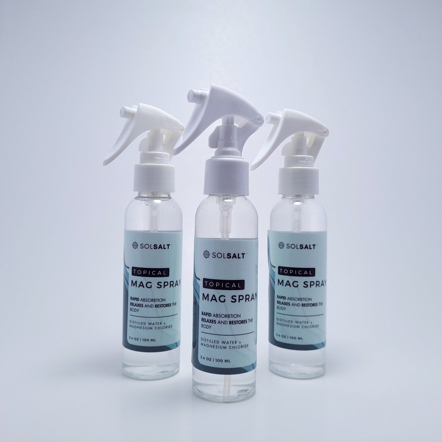 Three 100mL Spray bottles labeled 'SOL SALT' on a light gray background. Rapid Absorption. Relaxes and Restores the body.